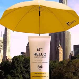 Umbrella Opens from Sunscreen Bottle in a fake-out-of-home ad of IT Cosmetics