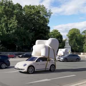Cars Loaded with Armchairs in a fake-out-of-home ad of IWC Home