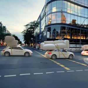 Cars Loaded with Furnitures in a fake-out-of-home ad of IWC Home