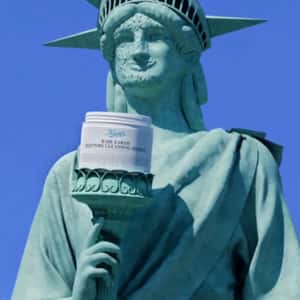 Statue of Liberty Applies Mask in a face-out-of-home ad of Kiehl's