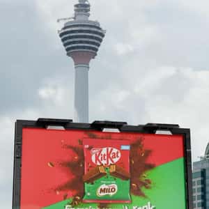 Billboard Burst by Soccer Ball in a fake-out-of-home ad of KitKat