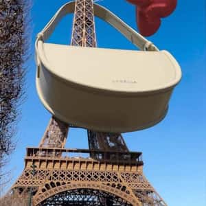 Eiffel Tower Wears a Handbag in a fake-out-of-home ad of Labella
