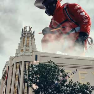 Climber Crafts Theater Tower in a fake-out-of-home ad of Le Grand Rex
