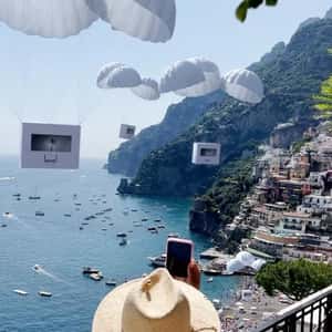 Parachutes Deliver Shoe Boxes in a fake-out-of-home ad Level Shoes