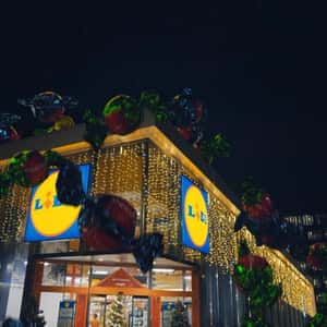Candies Rain Down at Store in a fake-out-of-home ad of Lidl