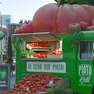 Tomatoes Display Above Food Truck in a fake-out-of-home ad of Lidl