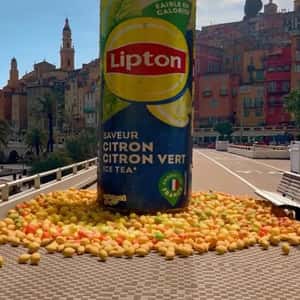 Canned Drink Wrapped with Lemons in a fake-out-of-home ad of Lipton Ice Te