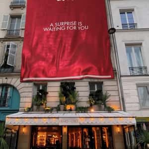 Red Banner Drapes Down Building in a fake-out-of-home ad of Liu Jo