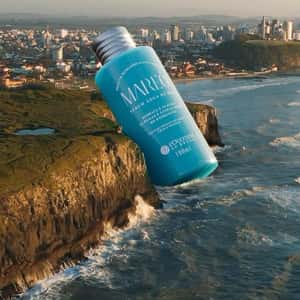 Serum Bottle Lands on the Coast in a fake-out-of-home ad of L'Occitane