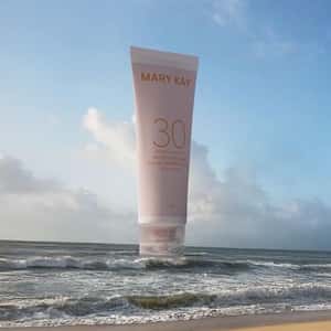 Sunscreen Inflates Above Ocean Waves in a fake-out-of-home ad of Mary Kay