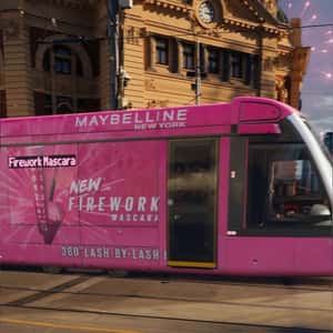 Pink Mascara-Themed Tram in a fake-out-of-home ad of Maybelline New York