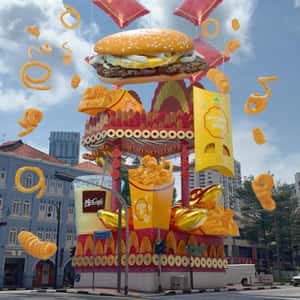 Flying Burger with Curly Fries in a fake-out-of-home ad of McDonald's