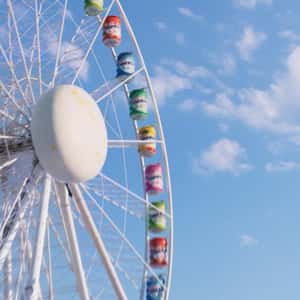 Ferris Wheel with Gum Container Wagons in a fake-out-of-home ad of Mentos