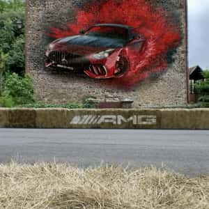 Sports Car Trails Red Smoke in a fake-out-of-home ad of Mercedes-AMG