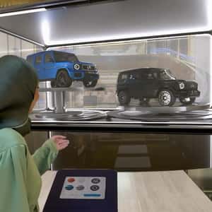 Car Display Rises from Floor in a fake-out-of-home ad of Mercedes-Benz