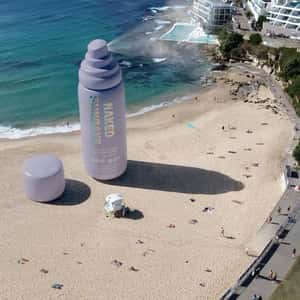 Face Mist Inflates on Beach in a fake-out-of-home ad of Naked Sundays