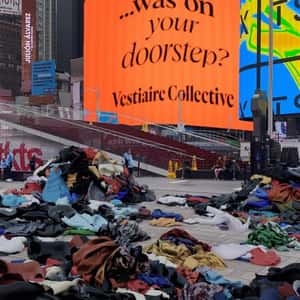 Clothes Rain Down Times Square in a fake-out-of-home ad of Vestiaire Collective