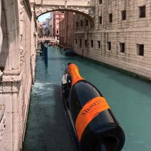 Wine Travels by Gondola in a fake-out-of-home ad of Mionetto Prosecco
