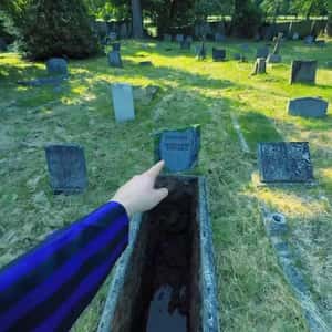 Man Fell into the Grave in a fake-out-of-home ad of Netflix
