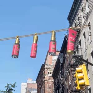 Haircare Products Glides on the Rope in a fake-out-of-home ad of OGX Beauty