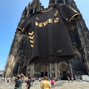 Jersey Hangs at Cologne Cathedral in a fake-out-of-home ad of FCKOELN