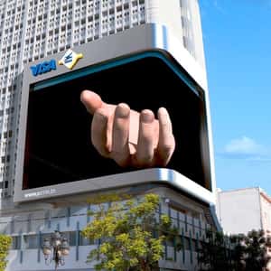 Card in Hand Emerges from Digital Screen in a fake-out-of-home ad of La Poste Tunisienne