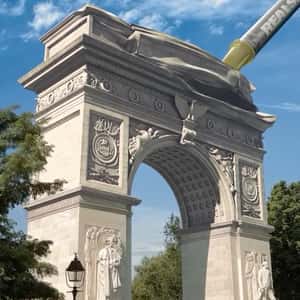 Syringe Inflates Monument Arch in a fake-out-of-home ad of RealSelf