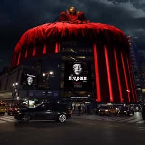 Lady Gaga Poses on Top of Arena in a fake-out-of-home ad of Madison Square Garden