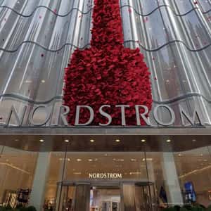 Rose Petals Create Perfume Bottle in a fake-out-of-home ad of Nordstrom