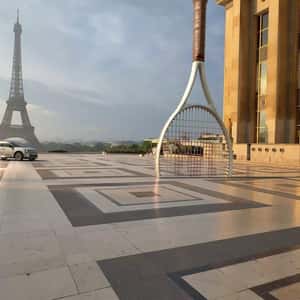 Car Passes Through Tennis Racket in a fake-out-of-home ad of Renault