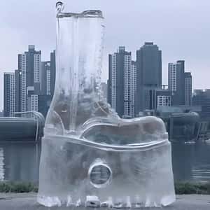 Giant Ice Boot Rises on the Riverside in fake-out-of-home ad of Balenciaga