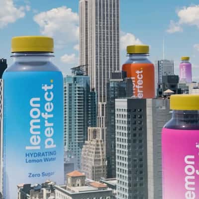 Bottles Emerging Beside Skyscrapers in a fake-out-of-home ad of Lemon Perfect