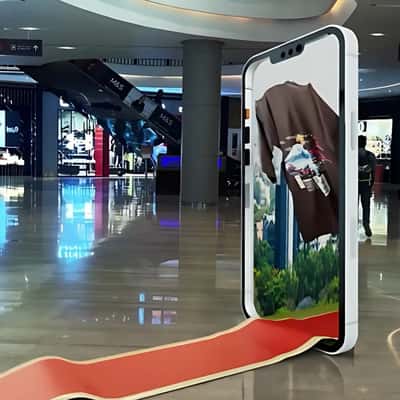 Fashion Items Emerges From Smartphone in a fake-out-of-home ad of Snitch