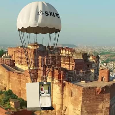 Parachute Drops Store in the City in a fake-out-of-home ad of Snitch