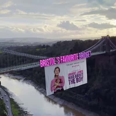 Poster Rolls Below the Bridge in a fake-out-of-home ad of Universal Pictures