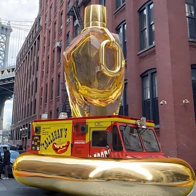 Food Truck Wrapped with Golden Chain Link in a fake-out-of-home of Rabanne