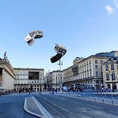 Buses Flying Above the City in a fake-out-of-home ad of Quoifaireabordeaux
