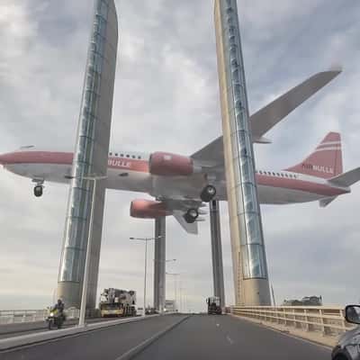 Suspended Plane Above the Bridge in a fake-out-of-home ad of Quoifaireabordeaux