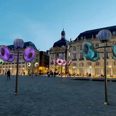 Rotating Neon Fans on Lamp Post in a fake-out-of-home ad of Quoifaireabordeaux