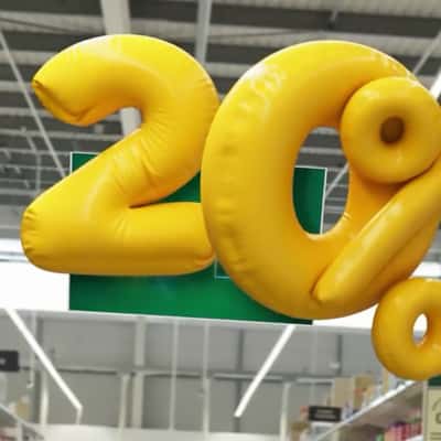 Pushcart Bumps into Inflatables Number in a fake-out-of-home ad of ASDA Mobile