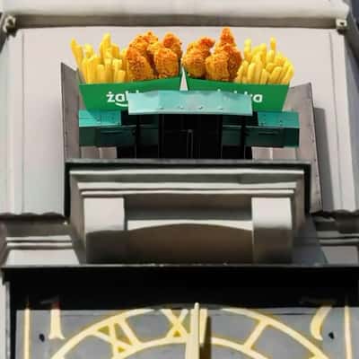 Chicken and Fries Revealed at Town Hall in a fake-out-of-home ad of Żabka