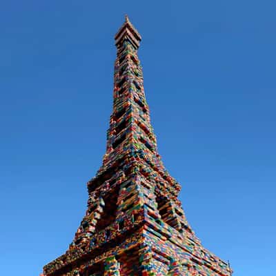 Eiffel Tower Covered with LEGO Bricks in a fake-out-of-home ad of LEGO