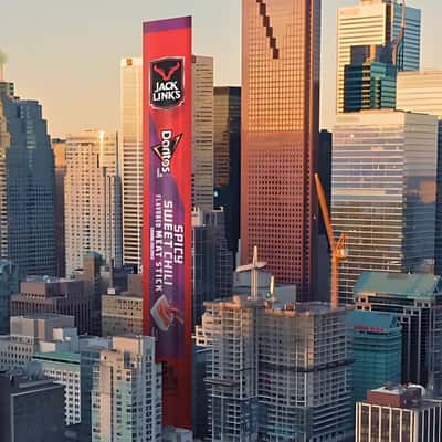 Tall Banner Display Along with Skyscrapers in a fake-out-of-home ad of Doritos