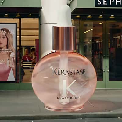 Dropper Applies Oil at Store Canopy in a fake-out-of-home ad of Kérastase