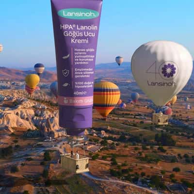 Floating Nipple Cream Hot Air Balloon in a fake-out-of-home ad of Lansinoh