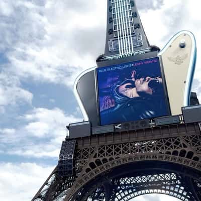 Electric Guitar on Eiffel Tower in a fake-out-of-home ad of Lenny Kravitz