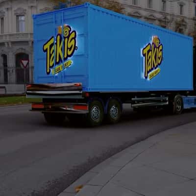 Drones Accompanying Container Truck in a fake-out-of-home ad of Takis