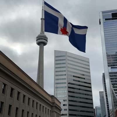 Flag Waving Flag on CN Tower in a fake-out-of-home ad of Toronto Flag
