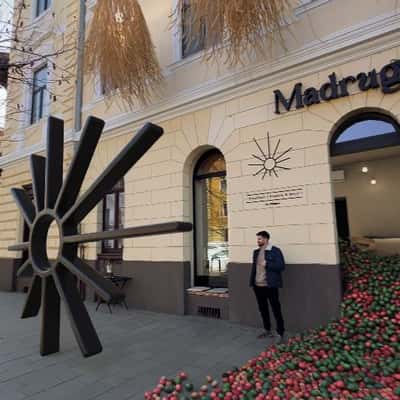 Wooden Logo Rolls on the Street in a fake-out-of-home ad of Madrugada
