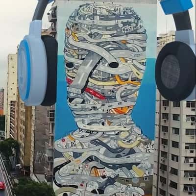 Headphone on Painted Building in a fake-out-of-home ad of Prompt Filmes